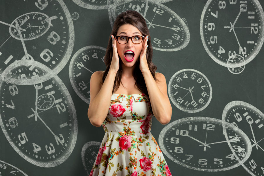 Woman overcome with stress, out of time management late anxious with clock background