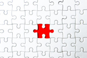 Fill the missing parts fragment of white jigsaw concept puzzle