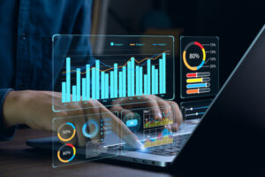 Businessman works on laptop showing dashboard for insight reports of utilization